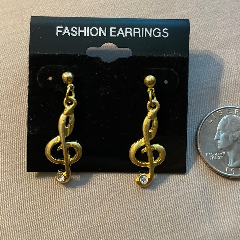Golden treble clef music note earrings
